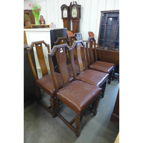 176 - A set of six elm and oak dining chairs
