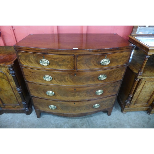 2 - A George III mahogany bow front chest of drawers