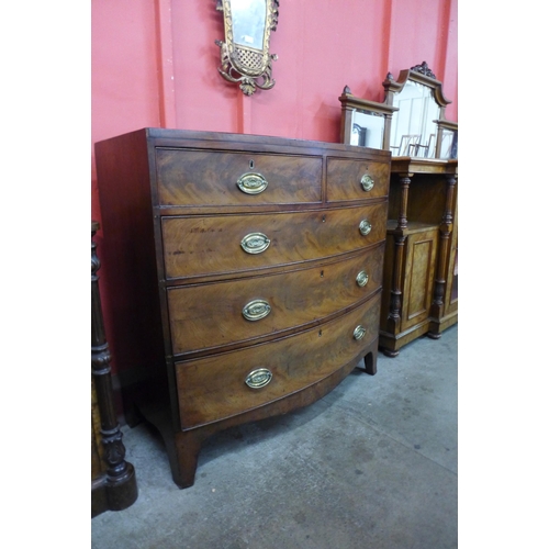 2 - A George III mahogany bow front chest of drawers