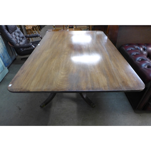 258 - A Regency mahogany rectangular dining table