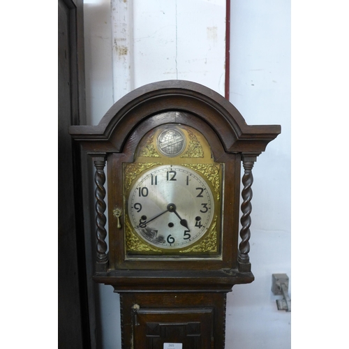 265 - An early 20th Century oak dwarf longcase clock