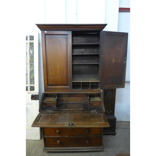 266 - A George II oak bureau bookcase