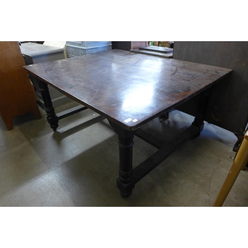 278 - A Victorian painted beech kitchen table with an elm top