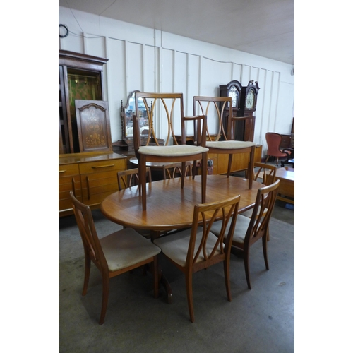 28 - A G-Plan Fresco teak extending dining table and eight chairs