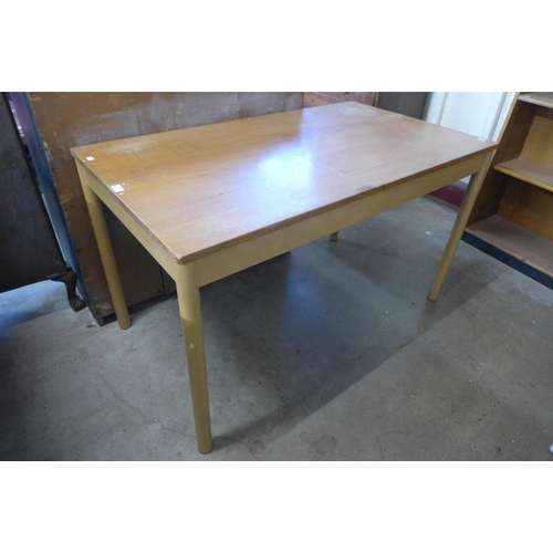 281 - An Ercol Blonde ash and beech dining table