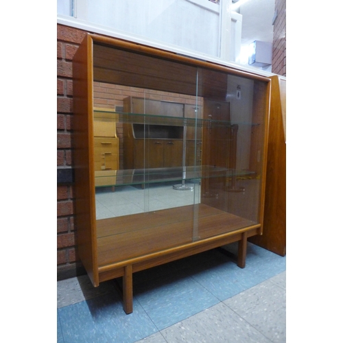 38 - A Turnidge of London teak display cabinet