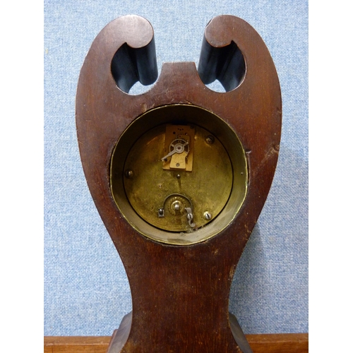 407 - An Art Nouveau inlaid mahogany mantel clock