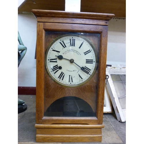 410 - An early 20th Century oak cased Blick Time Recorders Ltd., London clock