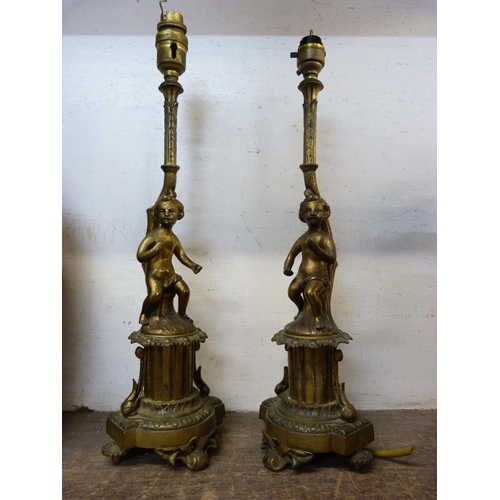 422 - A pair of figural ormolu cherub table lamps