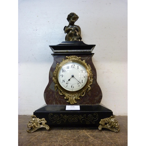 426 - A French figural marble and ormolu mantel clock