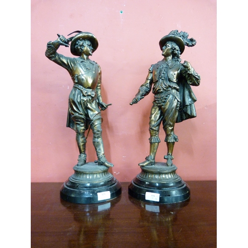 428 - A pair of 19th Century French bronzed spelter figures of cavaliers