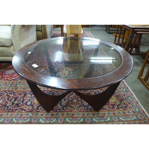 45 - A G-Plan Astro circular teak and glass topped coffee table