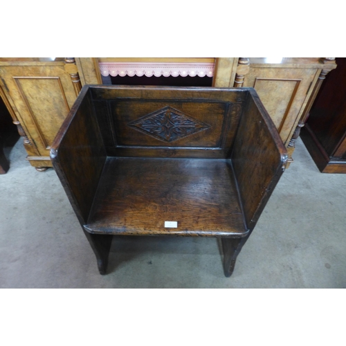 7 - A small 17th Century style carved oak box seat