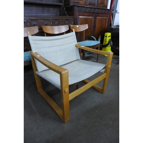 76 - A Danish Bernstorffminde Mobilfabric beech safari chair