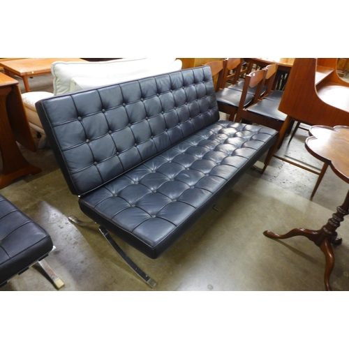85 - A Barcelona style chrome and black leather settee