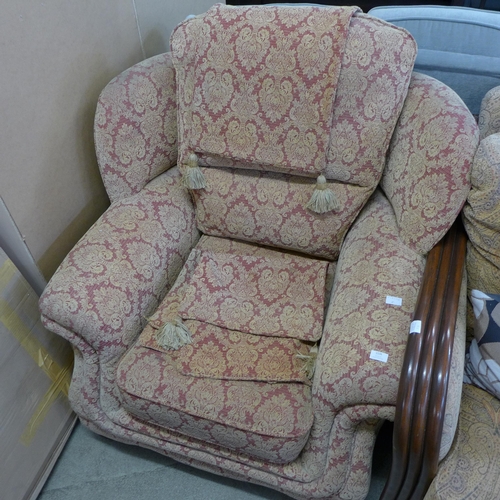 1587 - A red and beige patterned armchair