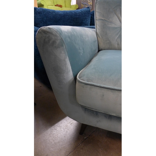 1305 - An aqua velvet upholstered armchair