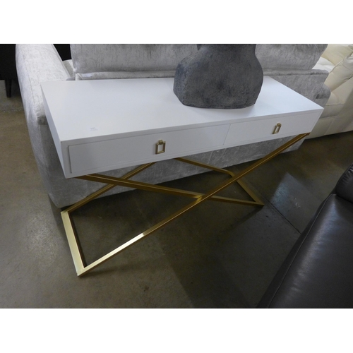 1327 - A white two drawer console table with gold legs