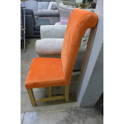 1427 - An orange velvet rollback side chair