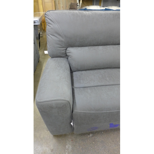 1435 - A Paisley grey fabric three seater power reclining movie sofa with adjustable console  * This lot is... 