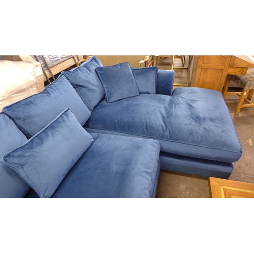 1440 - A deep ocean blue velvet upholstered corner sofa