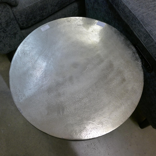 1323 - A circular metal lamp table with antlers for legs