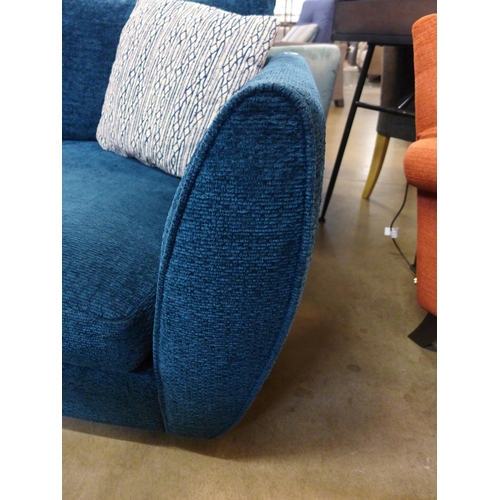 1324 - A deep blue textured velvet upholstered two seater sofa
