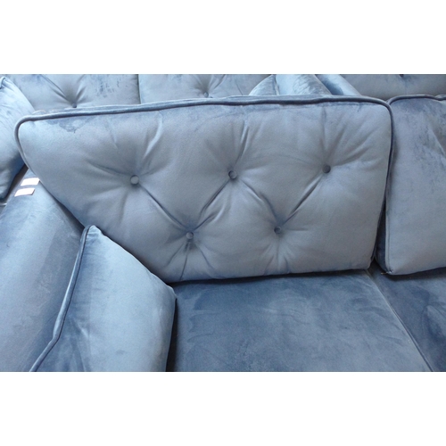 1473 - A blue velvet Hoxton three seater, two seater, armchair and footstool