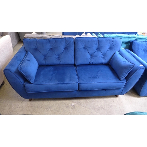1478 - A blue velvet Hoxton three seater sofa