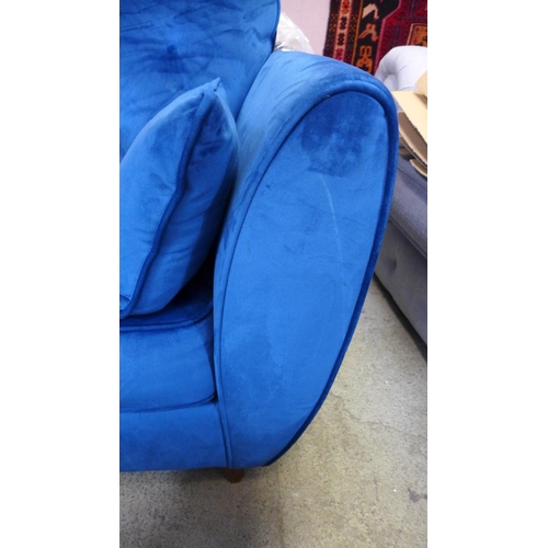 1482 - A blue velvet Hoxton two seater sofa