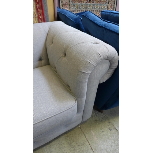 1487 - An Abbey grey upholstered chesterfield style three seater sofa - damaged feet