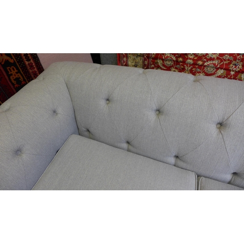 1487 - An Abbey grey upholstered chesterfield style three seater sofa - damaged feet