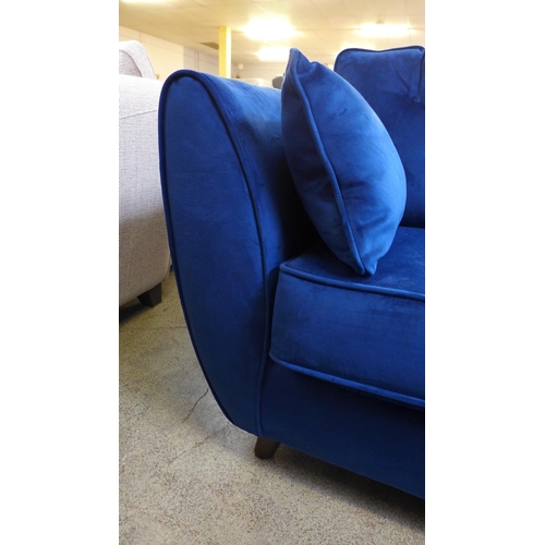 1492 - A blue velvet Hoxton three seater sofa