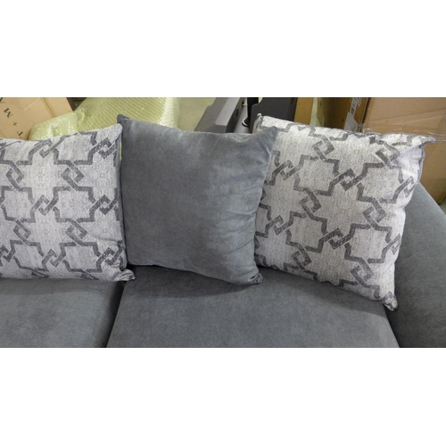 1504 - A grey and patterned corner sofa - damaged frame