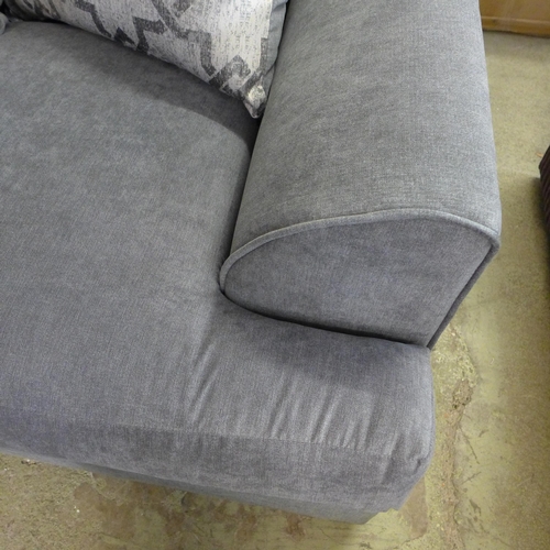 1504 - A grey and patterned corner sofa - damaged frame