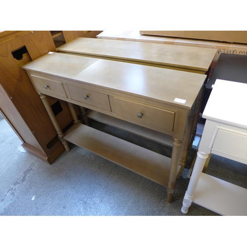 1542 - A pair of three drawer console tables