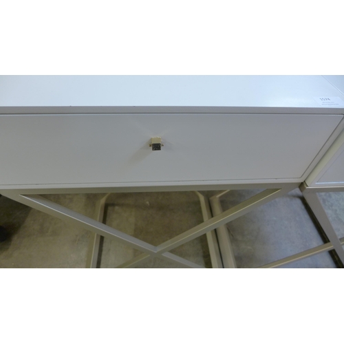 1574 - A pair of white bedside tables with cross legs