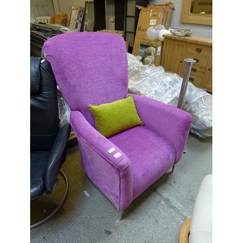 1577 - An amethyst fabric armchair