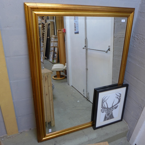 1598 - A large gold framed rectangular mirror and print depicting a stag