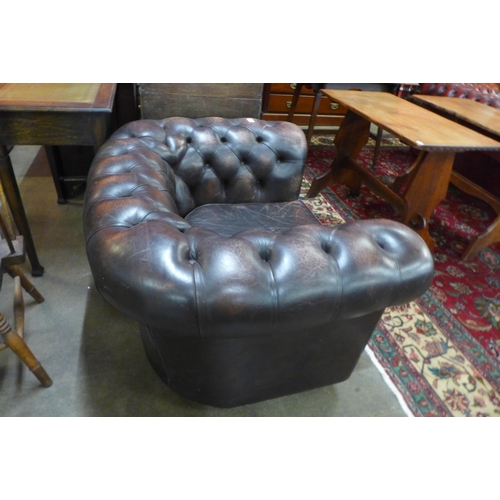 599 - A Chesterfield chestnut brown leather club chair