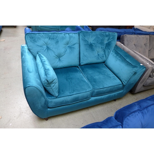 1314 - An aquamarine velvet Hoxton two seater sofa