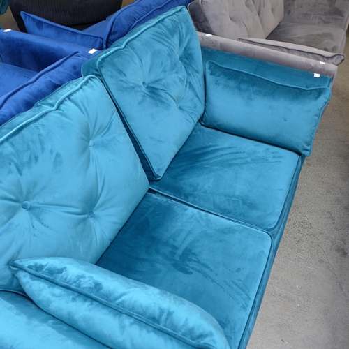 1314 - An aquamarine velvet Hoxton two seater sofa