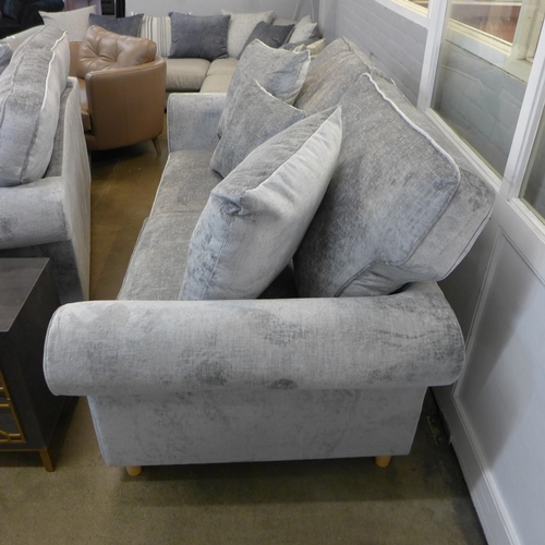 1324 - A pair of Mosta Adele steel upholstered sofas (3 + 2) * This lot is subject to VAT