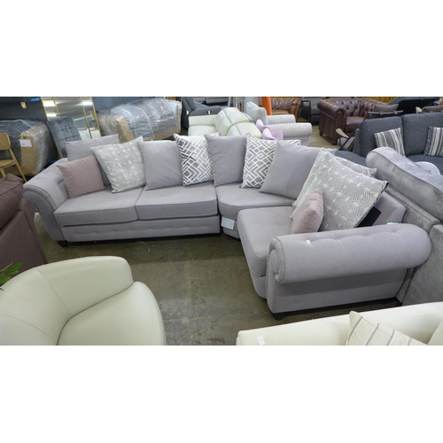 1335 - A Gracie parma violet upholstered and buttoned LHF curved corner sofa * this lot is subject to VAT