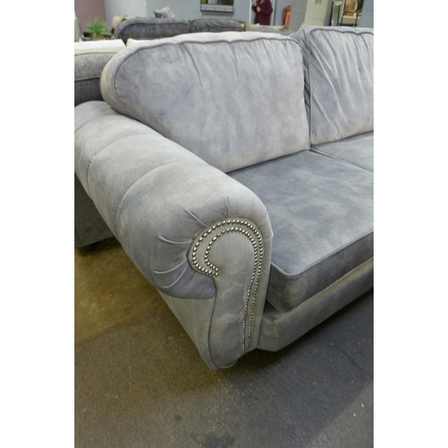 1336 - A Dynasty silver velvet and studded armed corner sofa * this lot is subject to VAT