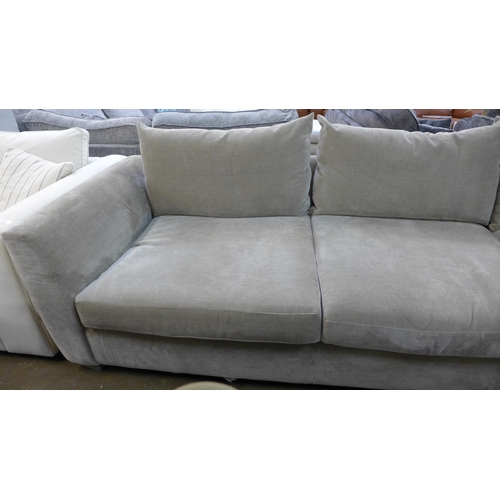 1353 - A large mink velvet upholstered corner sofa with footstool