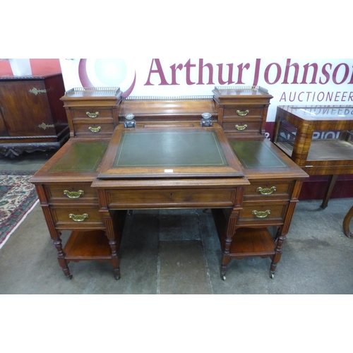 94 - A Victorian walnut and green leather topped Dickens desk, made by Charles Gregory & Co., Regent Stre... 