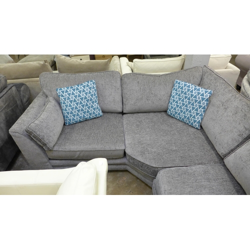 1420 - An Isla charcoal upholstered RHF corner sofa with blue geometric scatter cushions * this lot is subj... 