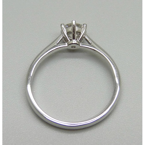 1008 - A white metal white stone solitaire ring, M