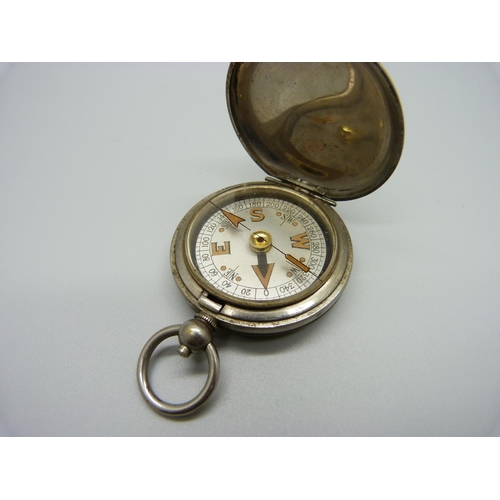 1011 - A WWI British compass, the case marked with broad arrow, Terrasse. W. Co., VI, 75063, 1918